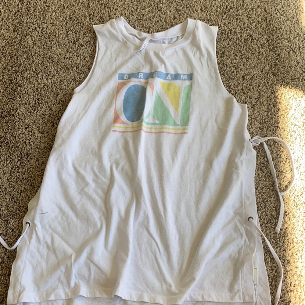 Muscle tank with ties on the side. Super cute